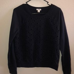 Sweater with mesh cut outs